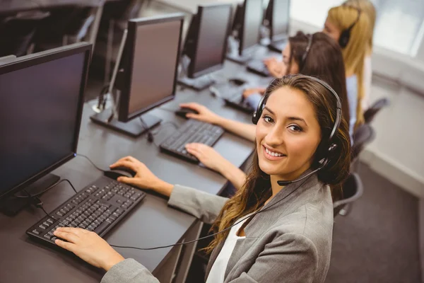 Smiling call centre agent — Stock Photo, Image