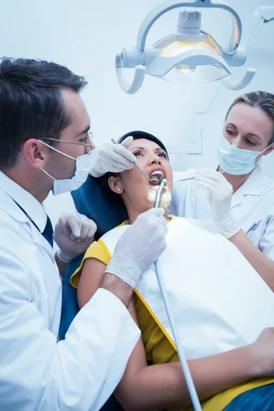 Male dentist with assistant Royalty Free Stock Photos