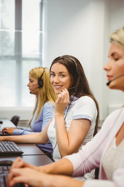 Smiling call centre agent — Stock Photo, Image