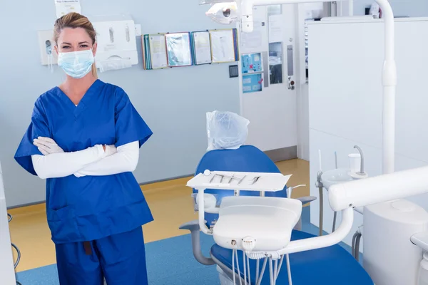 Dentist smiling with arms crossed — Stock Photo, Image