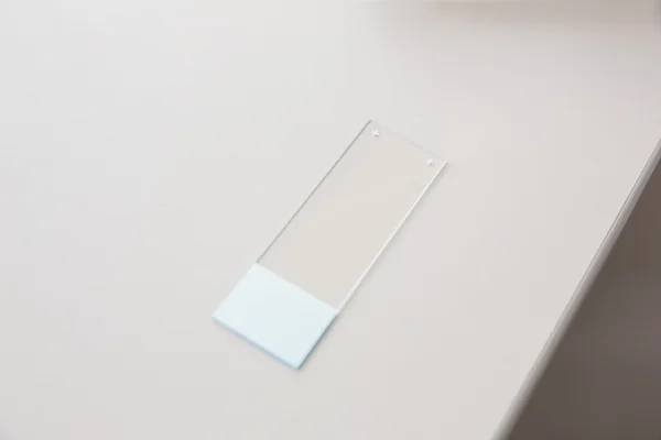 Tester slide on a desk — Stock Photo, Image