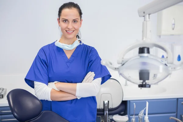 Cheerful dentist with arms crossed — Stock Photo, Image