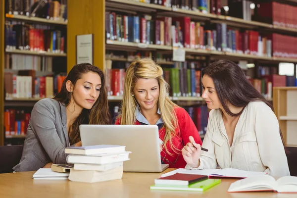 Smiling mature student with classmates — Stock Photo, Image