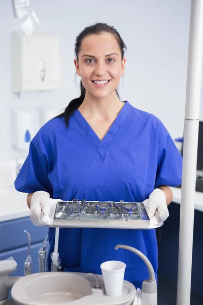 Dentist holding tray with equipment — Stock Photo, Image