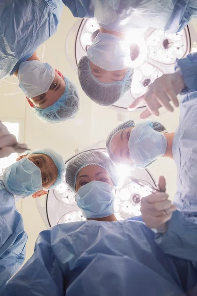 Medical students practicing surgery on model — Stock Photo, Image