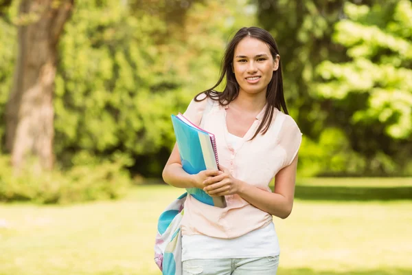 Portrait of an university student holding book — Stock Photo, Image