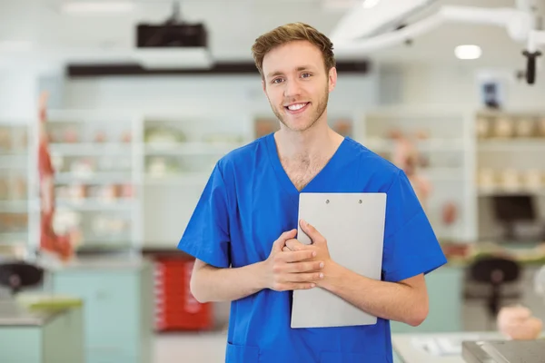 Young medical student smiling at the camera — Stock Photo, Image