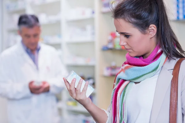 Customer holding a drug box — Stock Photo, Image