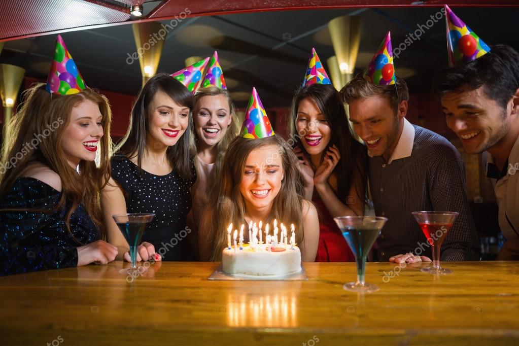 Friends celebrating a birthday together — Stock Photo © Wavebreakmedia 65292739