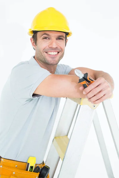 Technician holding pliers — Stock Photo, Image