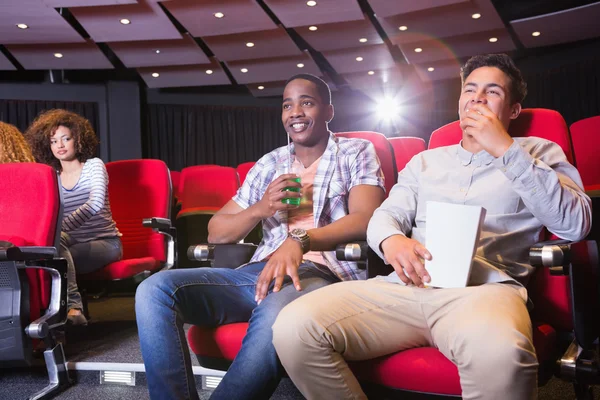 Young friends watching a 3d film — Stock Photo, Image