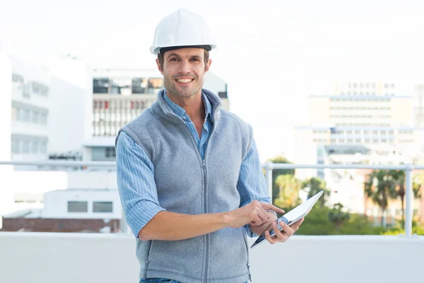 Happy architect using digital tablet — Stock Photo, Image