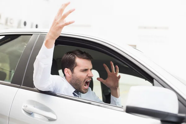 Businessman experiencing road rage — Stock Photo, Image