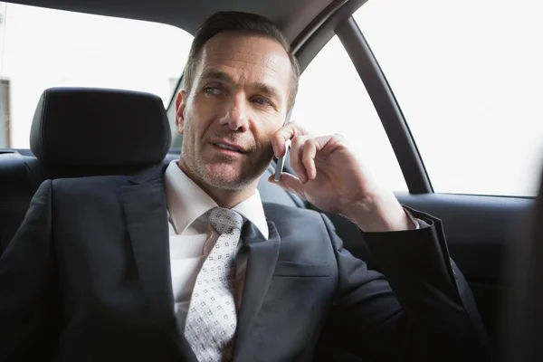 Handsome businessman making a phone call — Stock Photo, Image