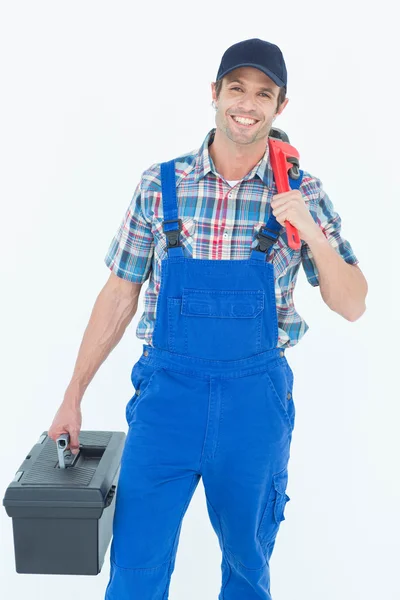 Plumber with monkey wrench and tool box — Stock Photo, Image