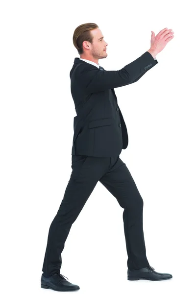 Smiling businessman with his hands up — Stock Photo, Image