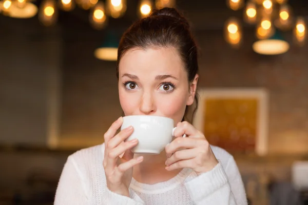Brunette having cup of coffee — Stock Photo, Image