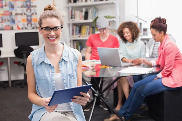 Fashion student using tablet pc — Stock Photo, Image