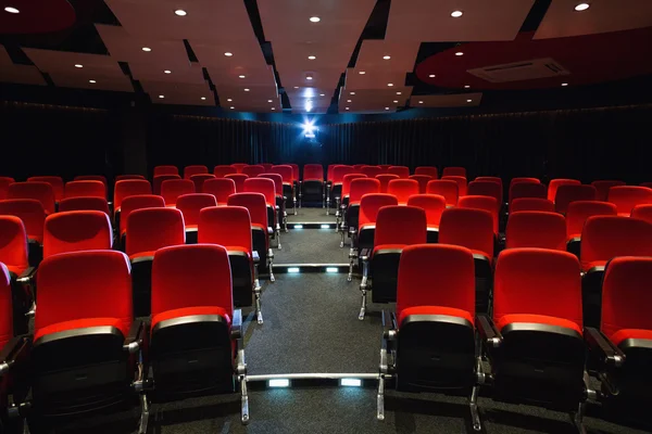 Empty rows of red seats — Stock Photo, Image