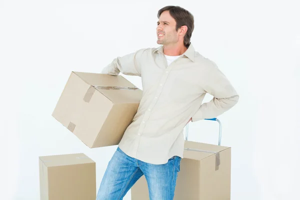 Delivery man with cardboard box — Stock Photo, Image