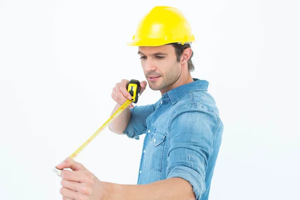 Male architect using tape measure — Stock Photo, Image