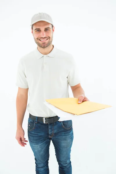Happy delivery man giving envelops — Stock Photo, Image
