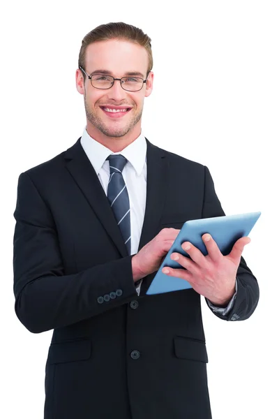 Zufriedener Geschäftsmann mit seinem Tablet-PC — Stockfoto