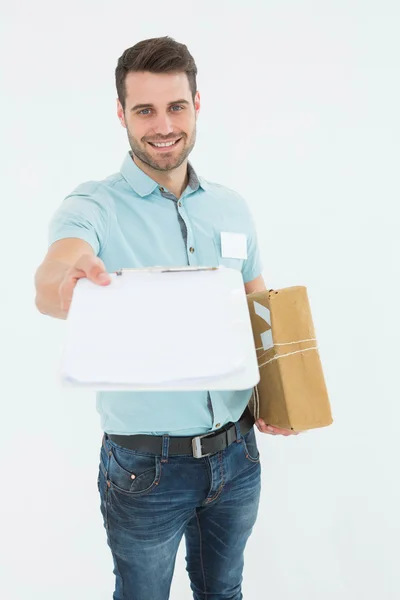 Delivery man with package — Stock Photo, Image