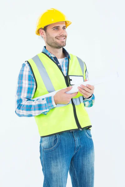 Thoughtful architect holding blueprint — Stock Photo, Image