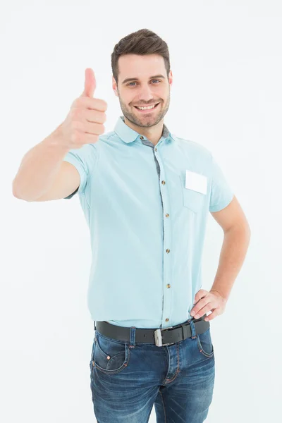 Leverans mannen gestikulerande tummen upp — Stockfoto