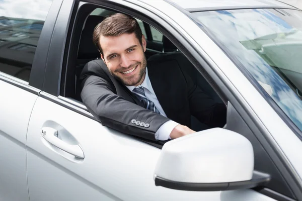 Empresário sentado no lugar dos motoristas — Fotografia de Stock