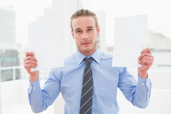 Cheerful businessman showing documents — Stock Photo, Image