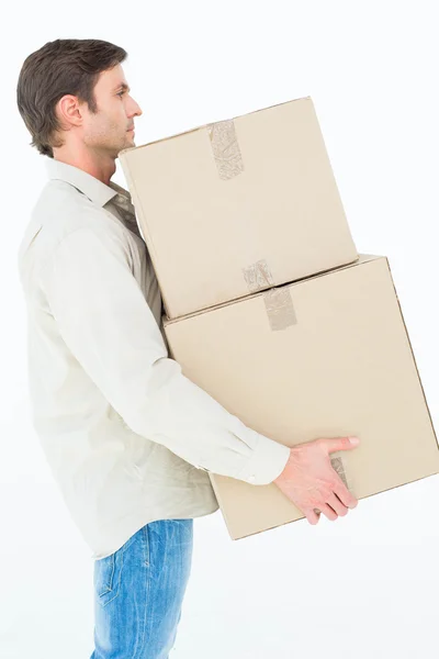 Entrega homem carregando caixas de papelão — Fotografia de Stock