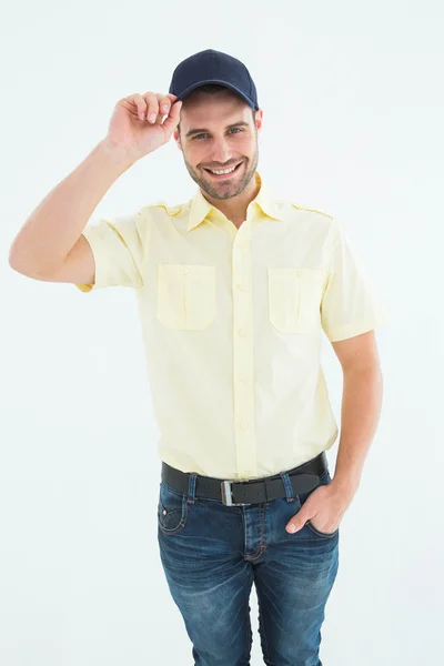 Delivery man wearing baseball cap — Stock Photo, Image