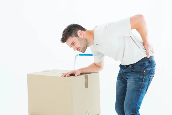 Uomo di consegna che soffre di mal di schiena — Foto Stock