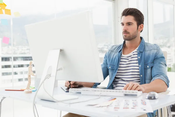 Designer working with digitizer and computer — Stock Photo, Image