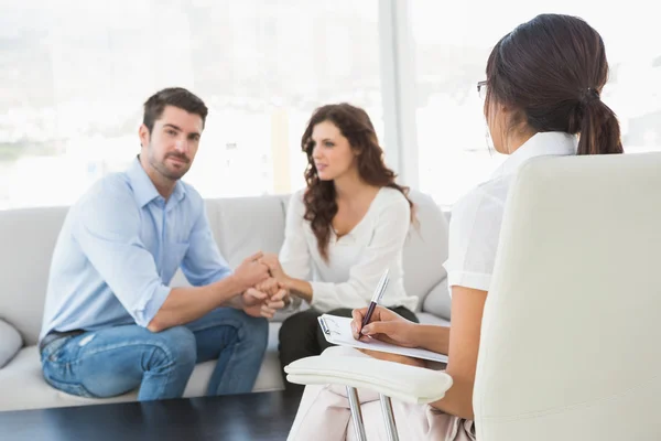 Reconciled couple smiling at each other — Stock Photo, Image