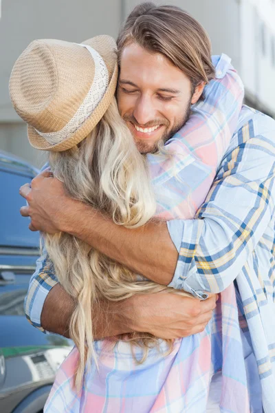Cute couple standing and hugging — Stock Photo, Image