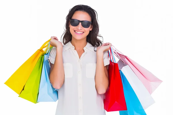 Pretty brunette with shopping bags — Stock Photo, Image