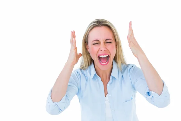 Furious blonde standing and screaming — Stock Photo, Image