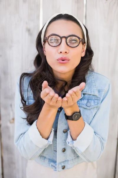 Pretty hipster blowing a kiss — Stock Photo, Image