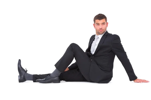 Businessman sitting on the floor — Stock Photo, Image