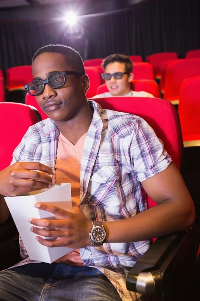 Young friends watching a 3d film — Stock Photo, Image