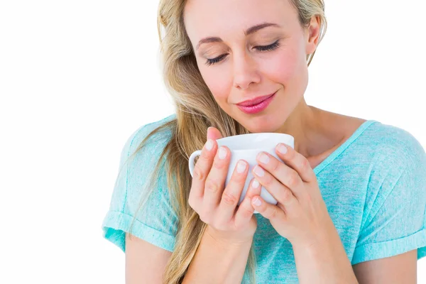 Blonde with hot beverage relaxing — Stock Photo, Image