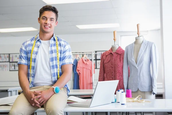 Fashion student with meter near models — Stock Photo, Image