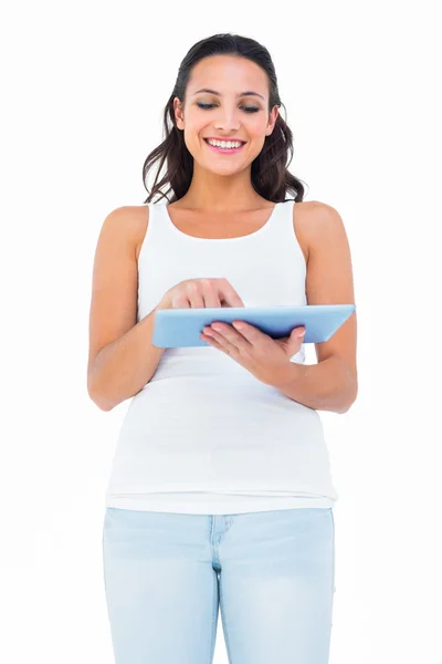 Pretty brunette using tablet pc — Stock Photo, Image