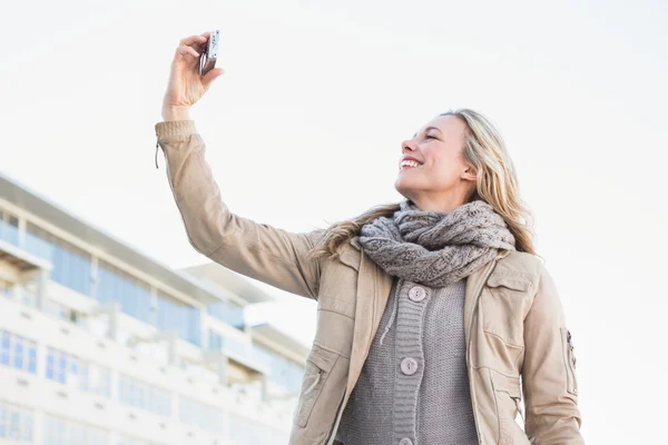 Blonde posing and taking a selfie — Stock Photo, Image