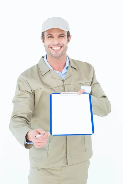 Delivery man giving clipboard — Stock Photo, Image