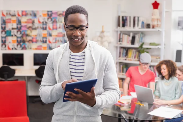 Fashion student using tablet pc — Stock Photo, Image