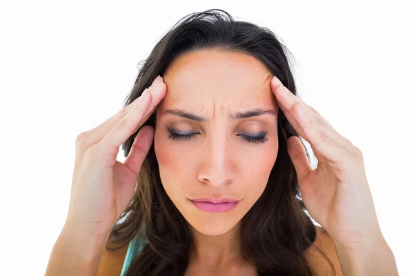 Pretty brunette with a headache — Stock Photo, Image